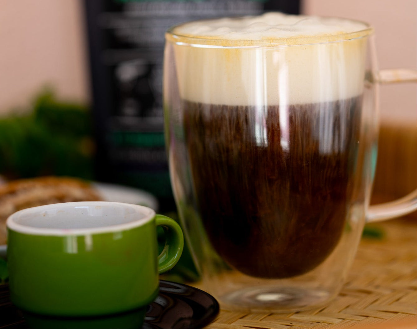 a freshly brewed mushroom coffee herbal latte layered with foamed oat milk, known as one of the best caffeine-free coffee alternatives for morning rituals by ZPlantMagic