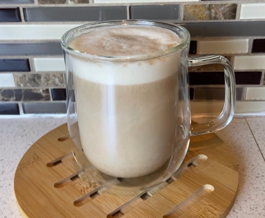 A beautiful cafe-style caffeine-free flat white recipe made with the best mushroom coffee, Koffee with a K by ZPlantMagic, and oat milk. Perfect for the at-home coffee vibes without the crash.