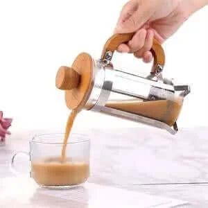 Bamboo Glass French Press pouring coffee