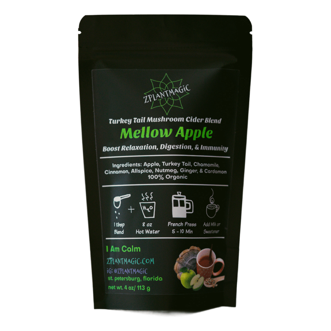 Front of small Mellow Apple package from ZPlantMagic, an apple cider mushroom latte blend featuring the ingredients and benefits of their caffeine-free coffee alternative made from mushrooms and herbs.