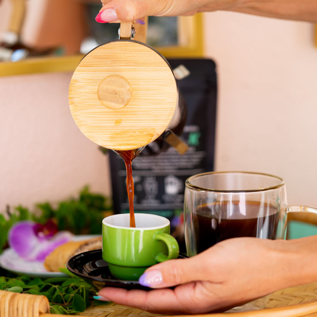 Pouring Koffee with a K into a mug for a caffeine-free coffee alternative made from mushrooms and herbs 