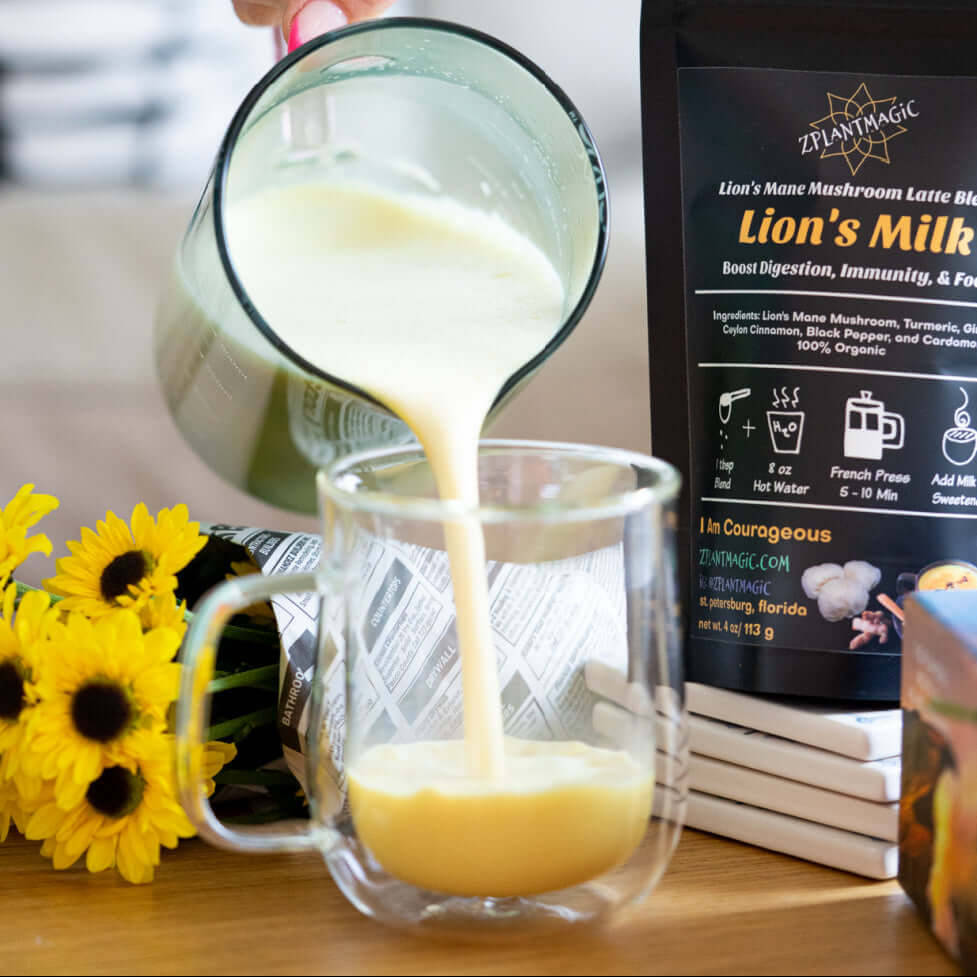 Lion's milk mushroom latte with creamy golden milk being poured for a soothing, caffeine-free ritual